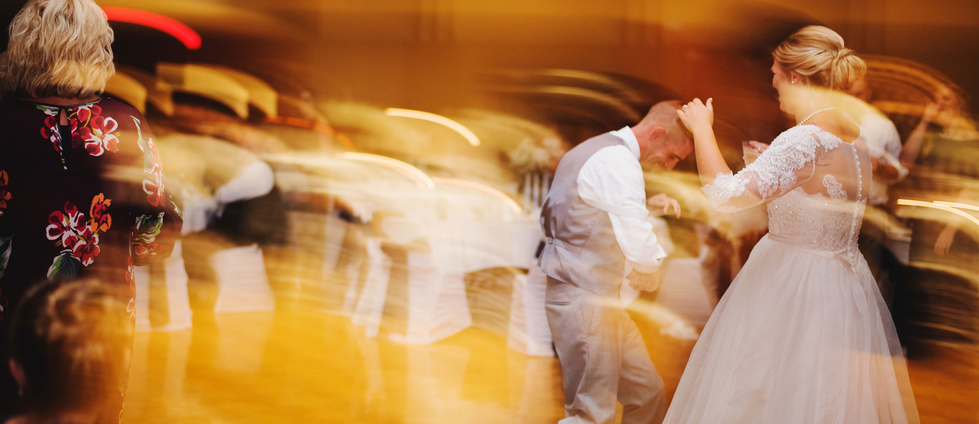 groom and bride dancing at reception